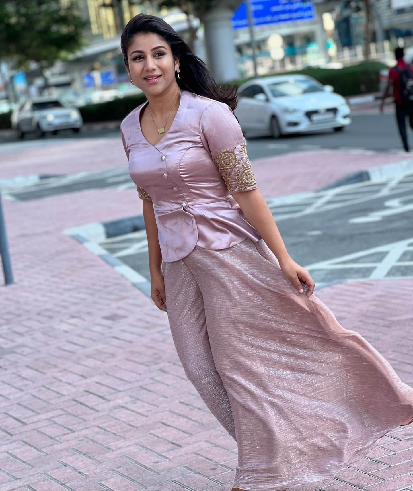 alya manasa in a pink dress